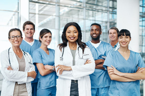 Group of medical professionals standing and posing for a photo