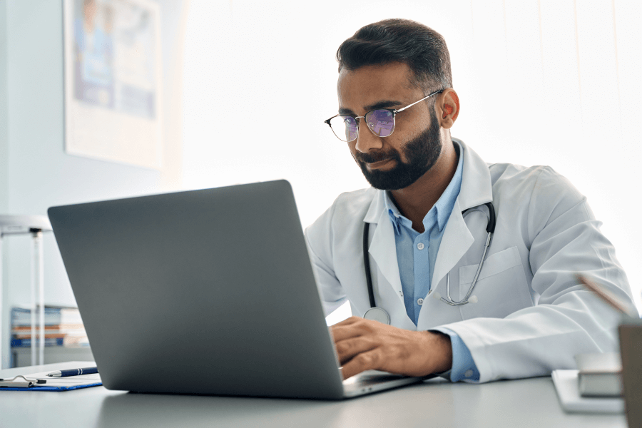 Medical professional on a computer